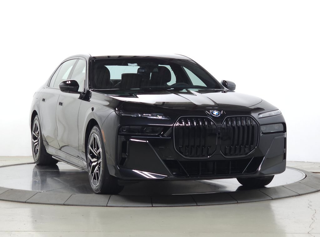 Used 2026 Black Sapphire Metallic BMW xDrive60 image 1
