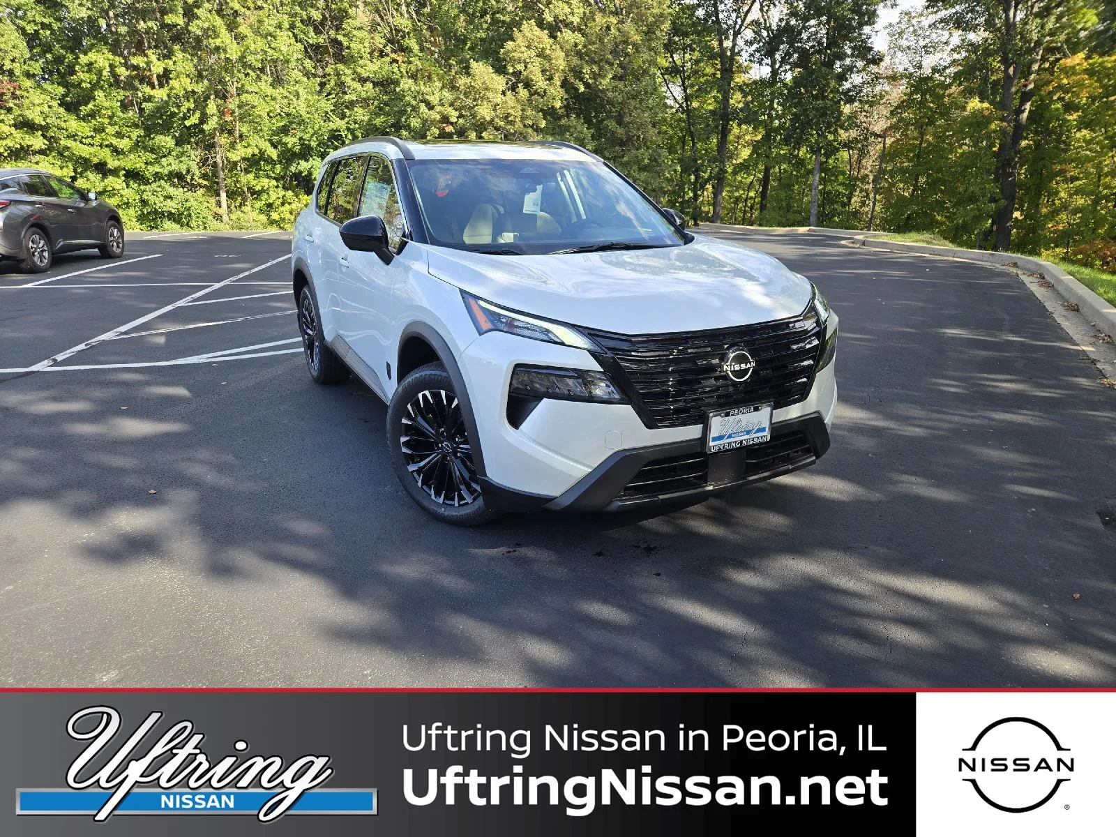 New 2026 Everest White Pearl Tricoat Nissan Dark Armor image 1