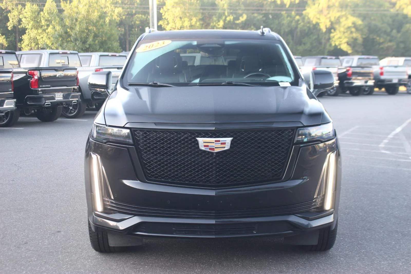 Used 2023 Black Raven Cadillac Sport image 2