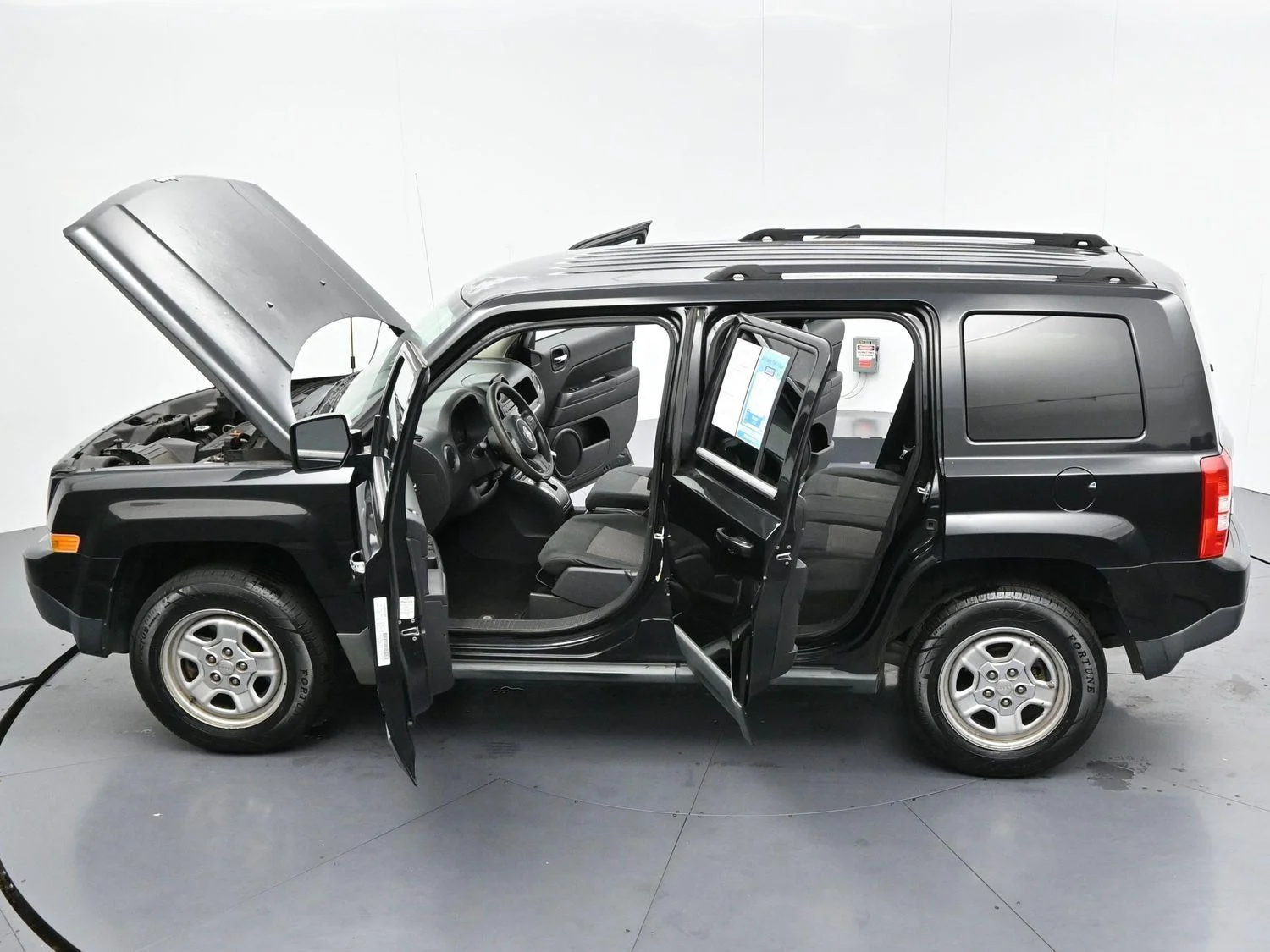 Used 2011 Brilliant Black Crystal Pearl Jeep Sport image 32