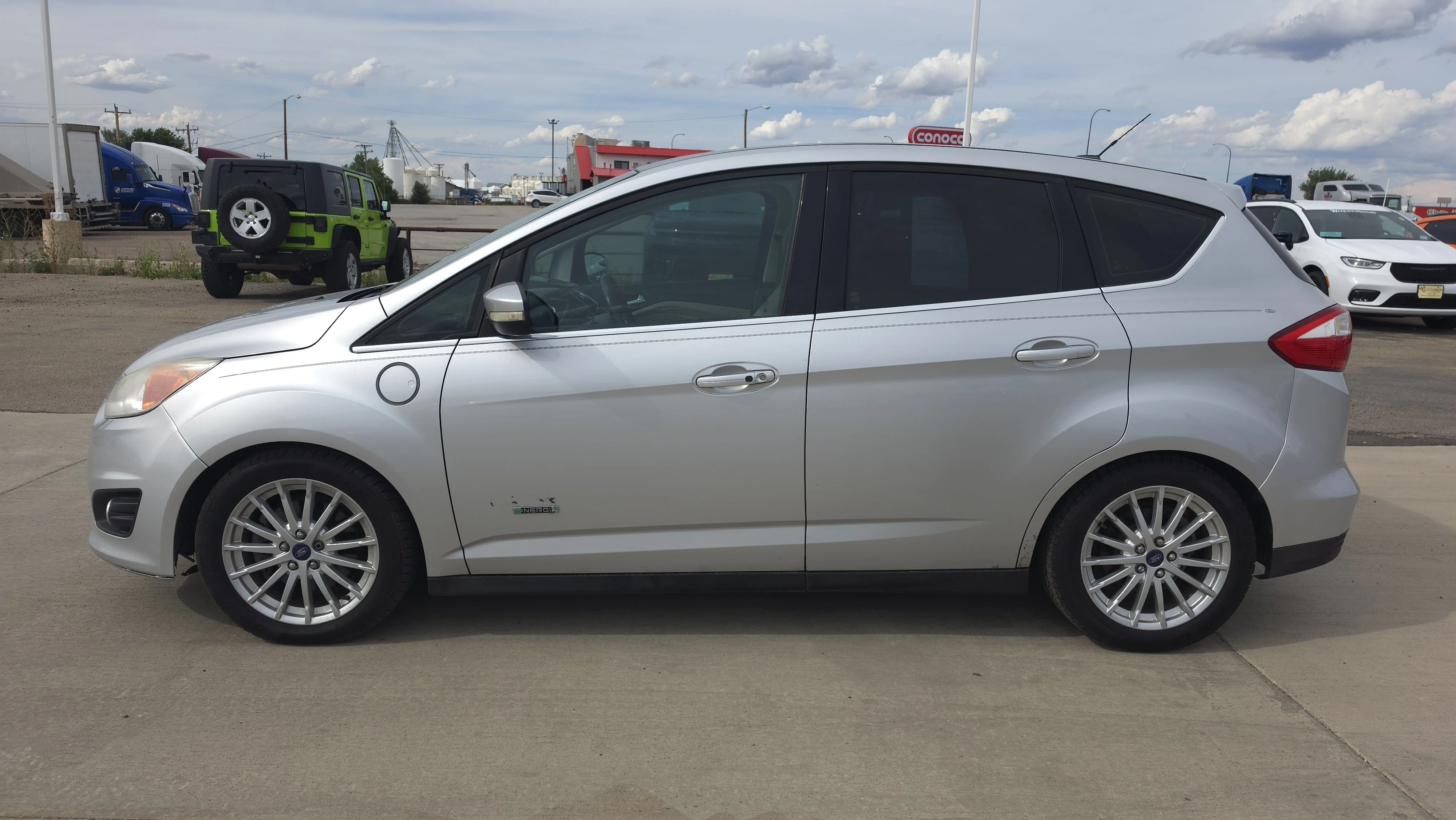 Used 2013 Ford C-Max Energi SEL with VIN 1FADP5CU2DL556099 for sale in Belle Fourche, SD