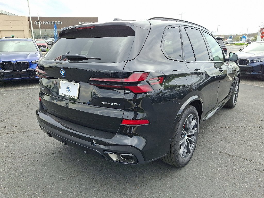 Used 2026 Black Sapphire Metallic BMW xDrive50e image 4