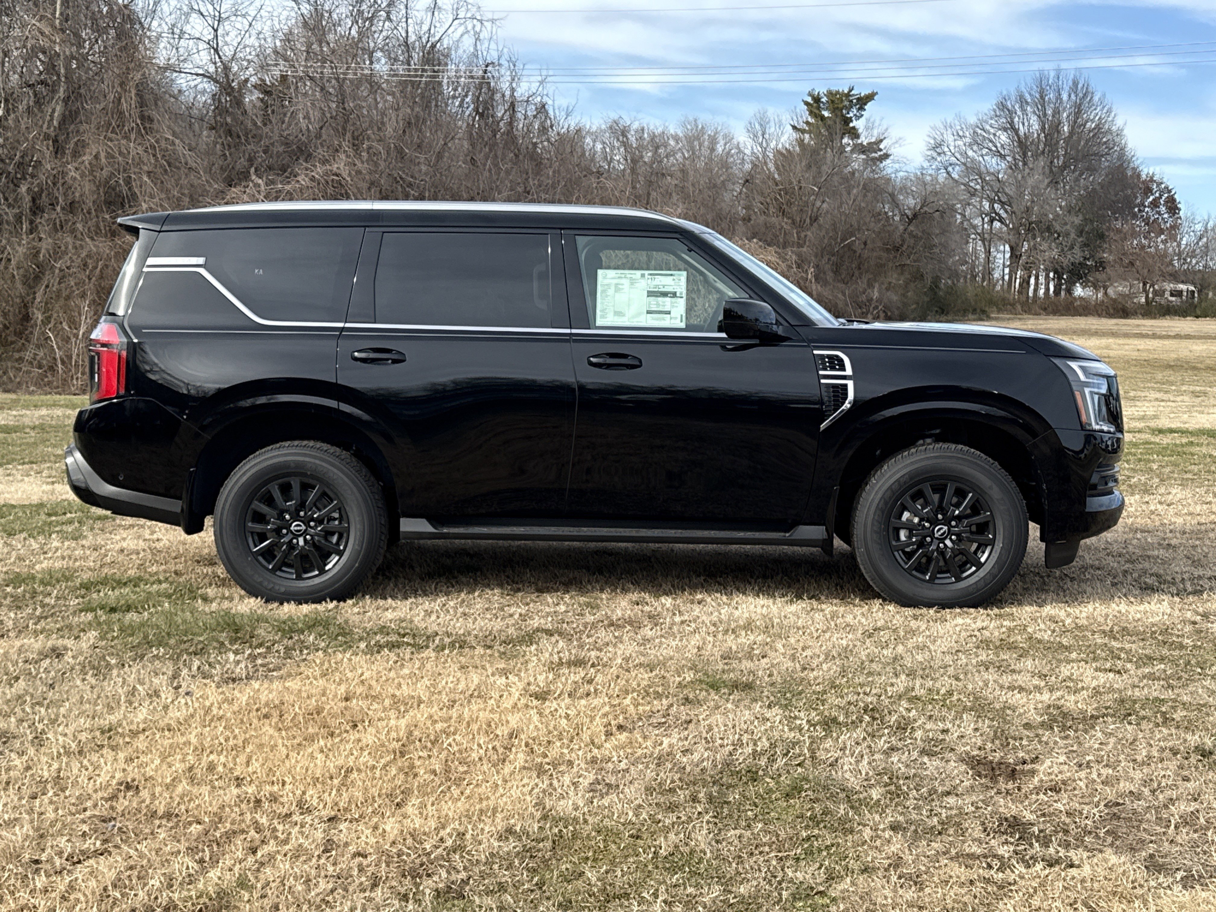 New 2026 Super Black Nissan SV image 2