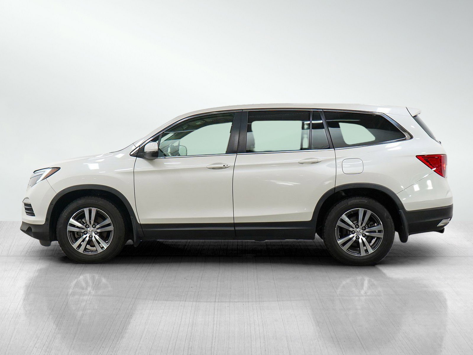 Used 2017 Honda Pilot EX-L with VIN 5FNYF5H56HB002993 for sale in Minneapolis, Minnesota