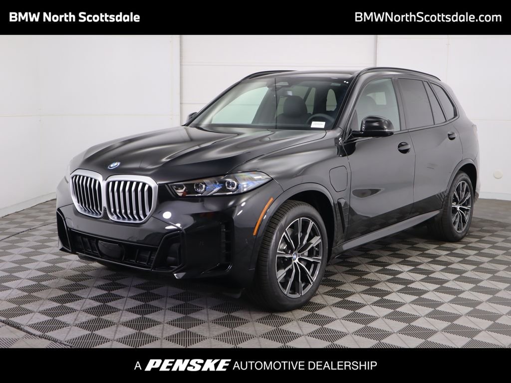 Used 2026 Black Sapphire Metallic BMW xDrive50e image 1
