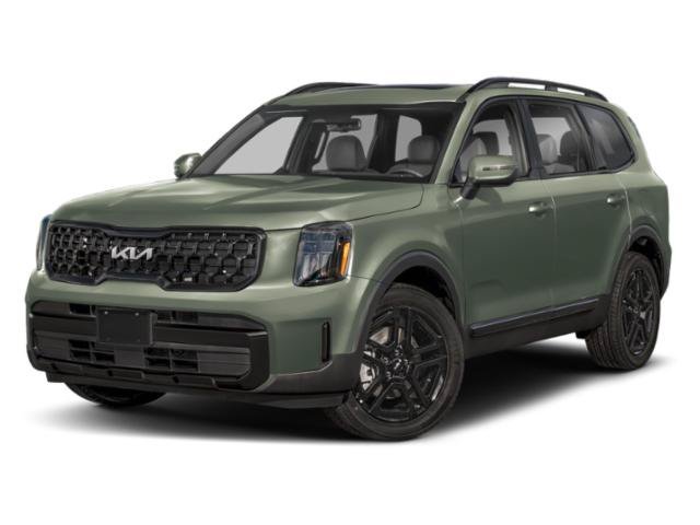 Used 2024 Jungle Green Kia EX X-Line image 1