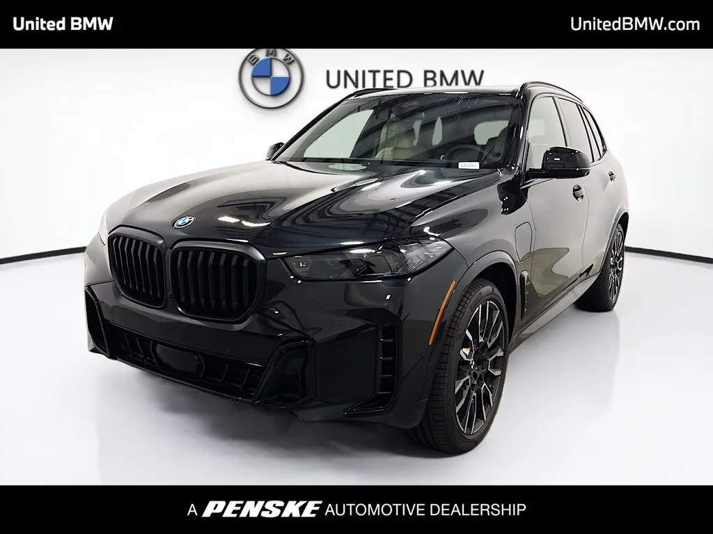 New 2026 Black Sapphire Metallic BMW xDrive50e image 1