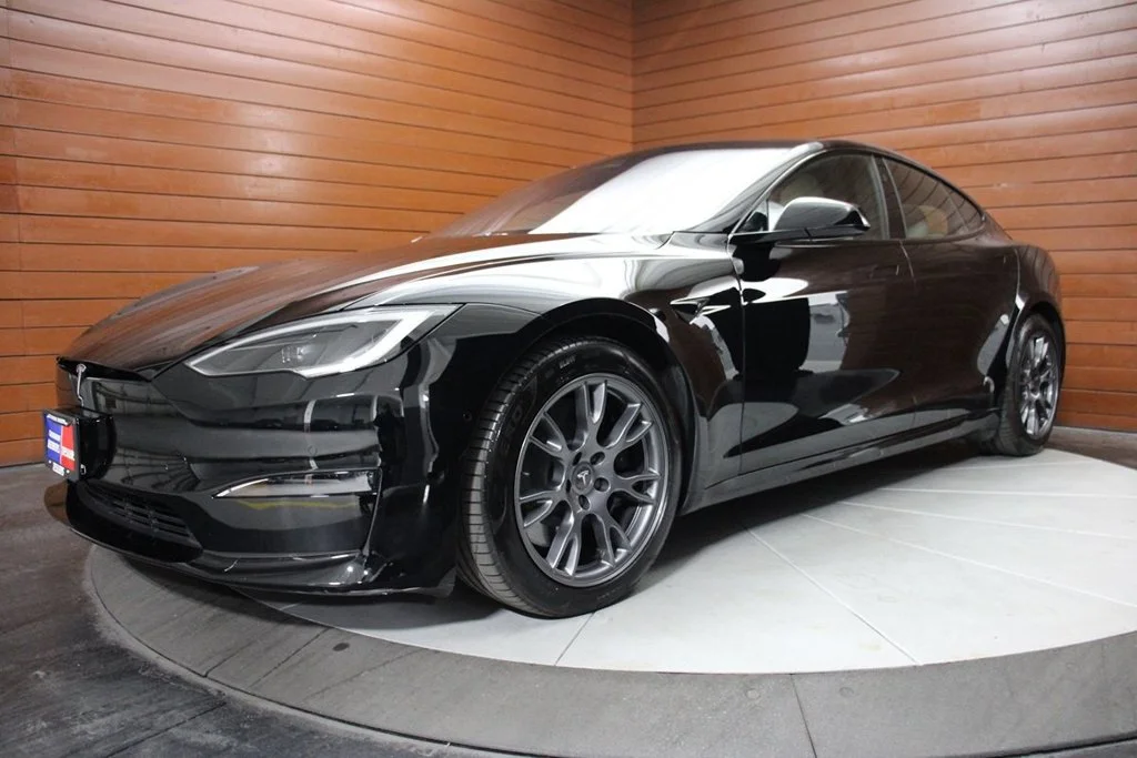 Used 2022 Solid Black Tesla Base image 1