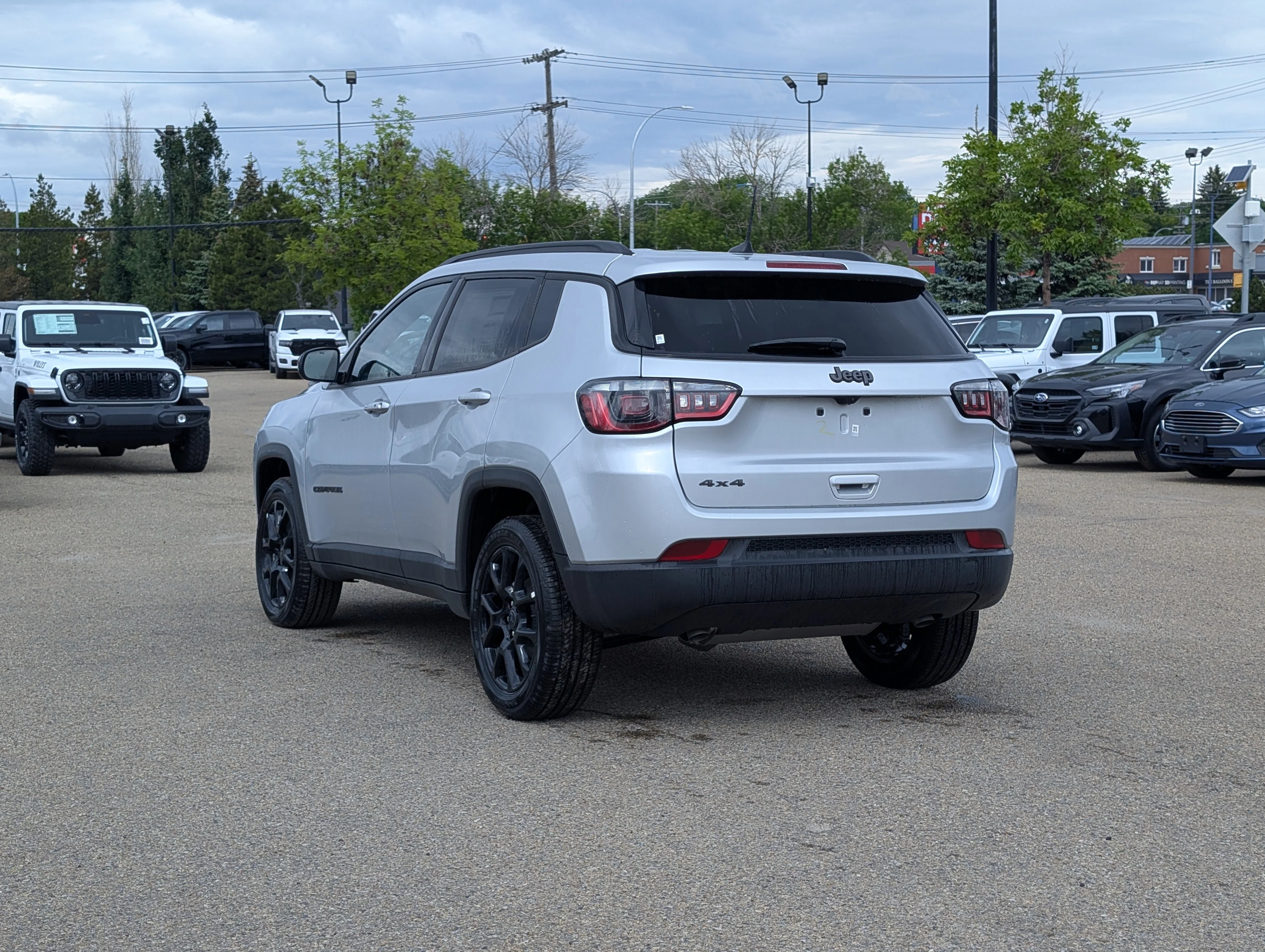 New 2026 Silver Zynith Metallic Jeep North image 4