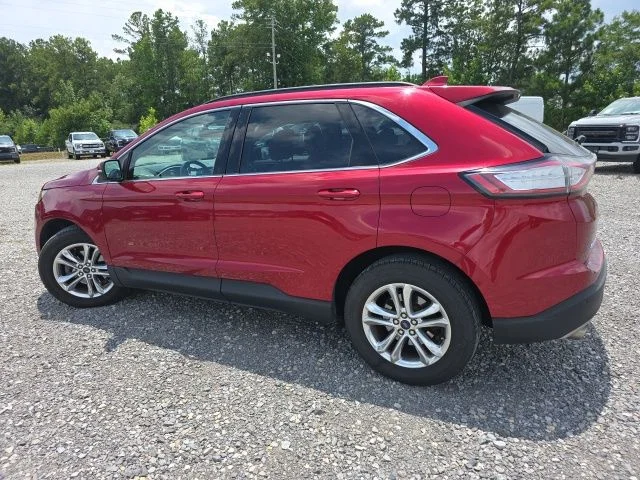 Used 2017 Ruby Red Metallic Tinted Clearcoat Ford SEL image 4