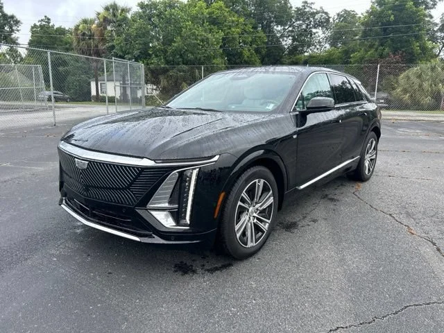Used 2024 Stellar Black Metallic Cadillac Luxury 1 image 1