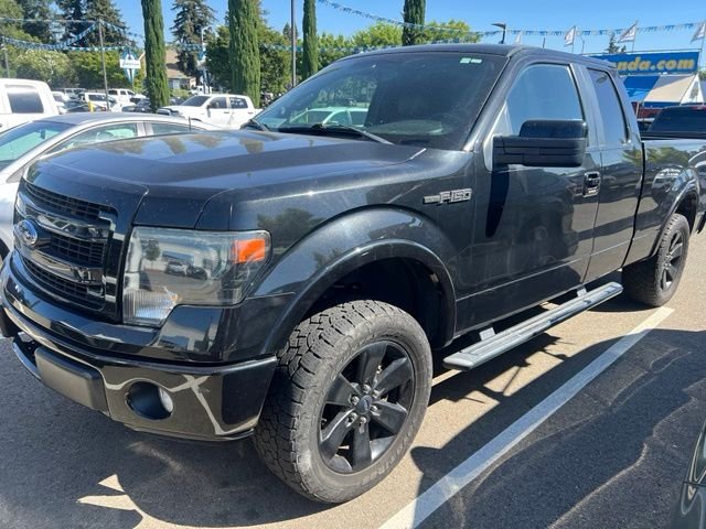 Used 2013 Black Ford FX2 image 1