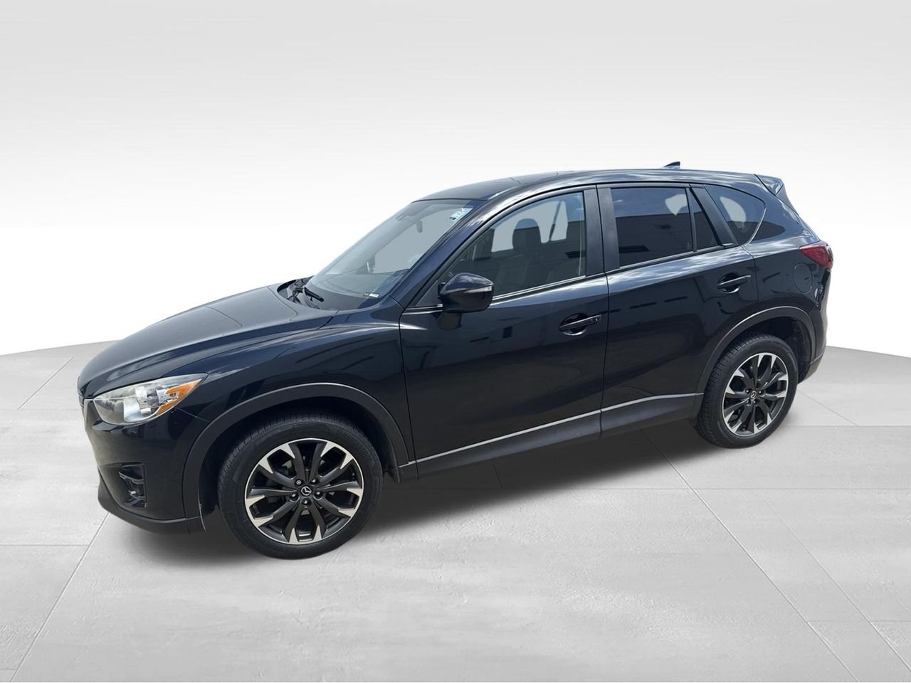 Used 2016 Black Mazda Grand Touring image 1