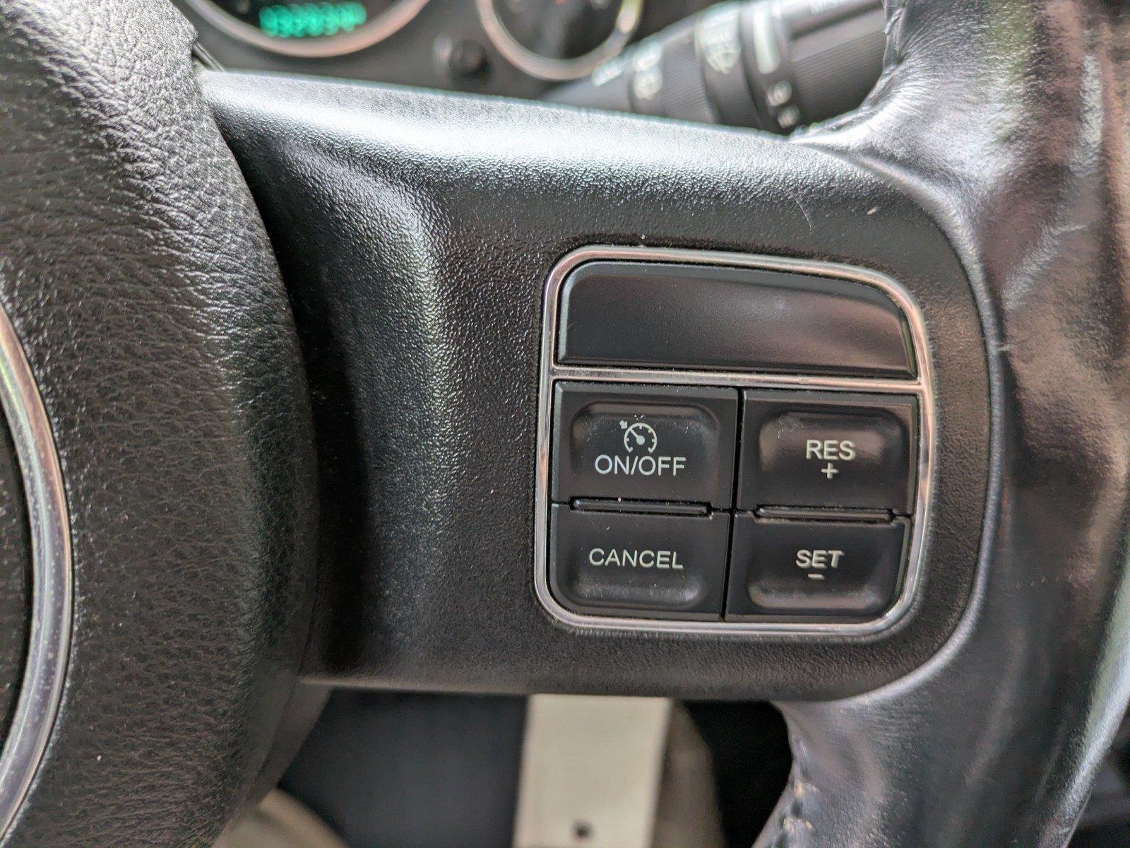 Used 2015 Hydro Blue Pearl Coat Jeep Sport image 22