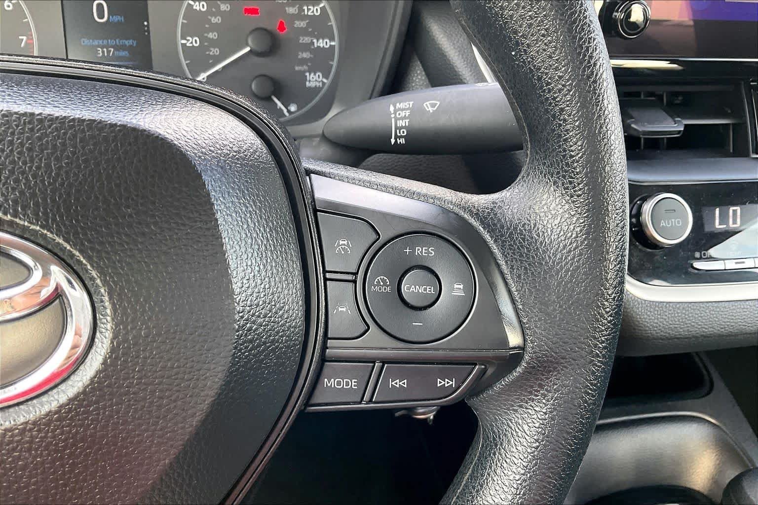 Used 2025 Classic Silver Metallic Toyota LE image 24