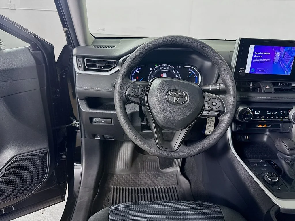 Used 2024 Midnight Black Metallic Toyota Hybrid LE image 20