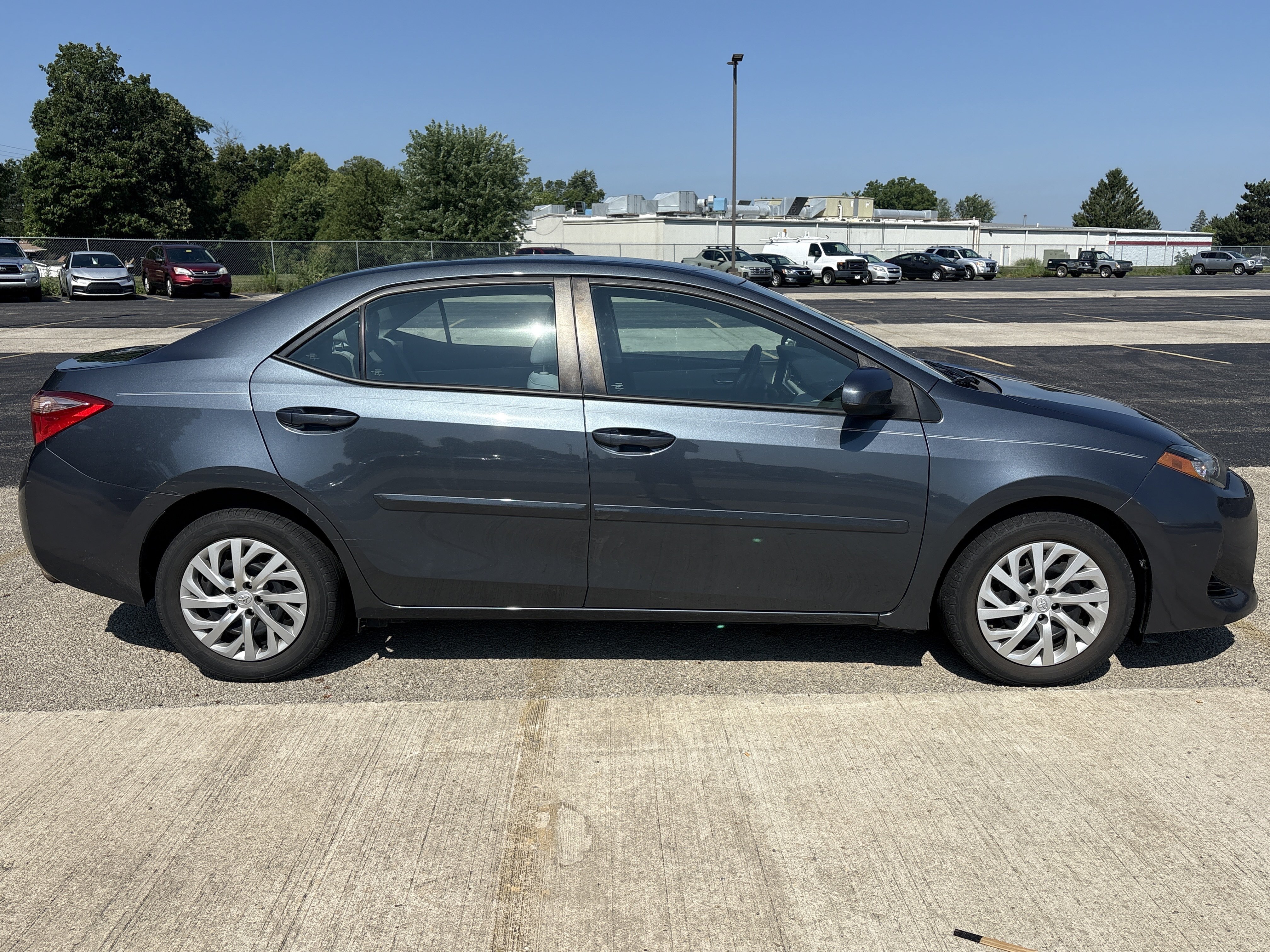 Used 2017 Slate Metallic Gray Toyota LE image 3