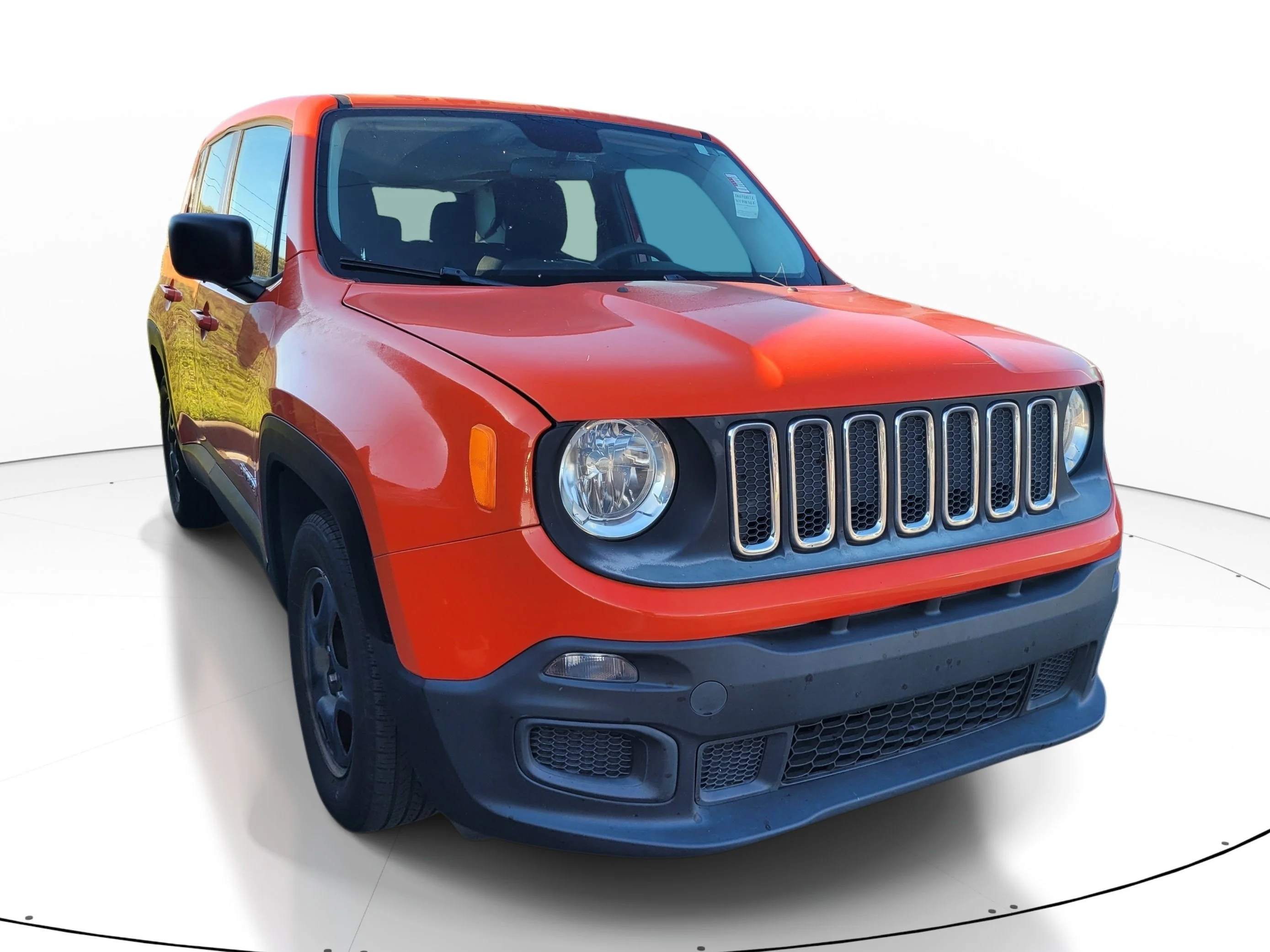 Used 2016 Omaha Orange Jeep Sport image 1