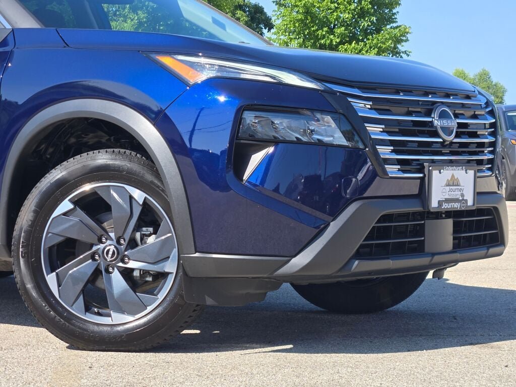 Certified Used 2025 Blue Nissan SV image 2