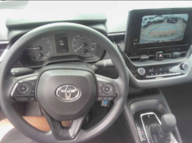 Used 2024 Classic Silver Metallic Toyota LE image 4