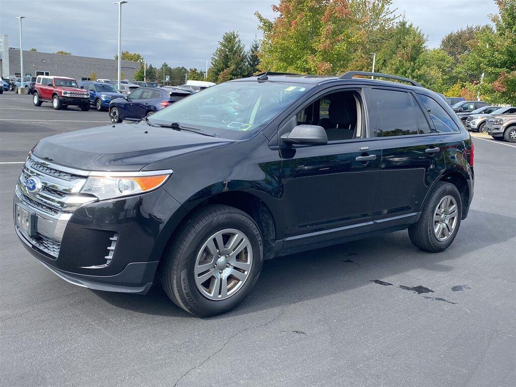 Used 2013 Tuxedo Black Metallic Ford SE image 6