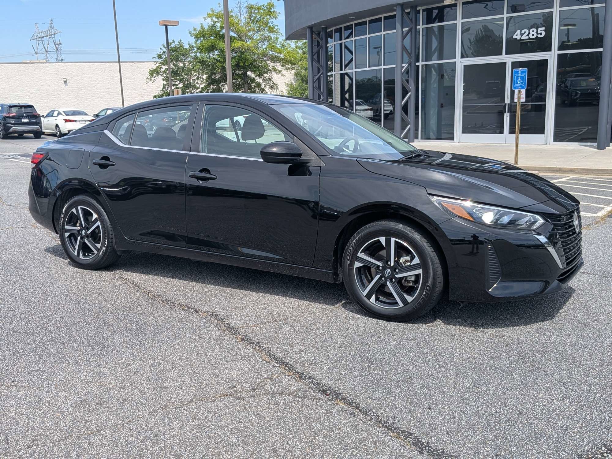 Used 2024 Black Nissan SV image 1