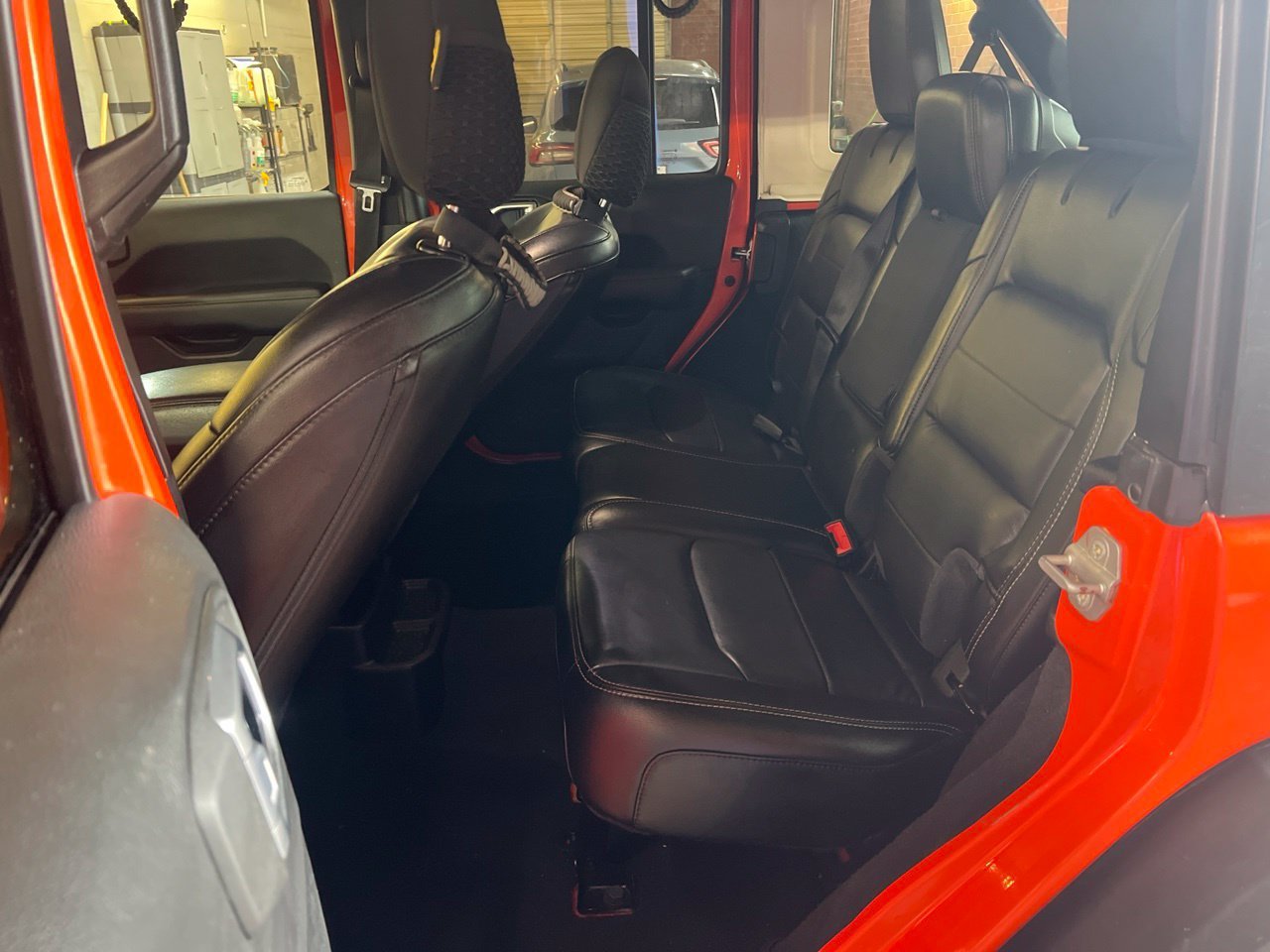 Used 2020 Orange Jeep Unlimited Sahara image 10