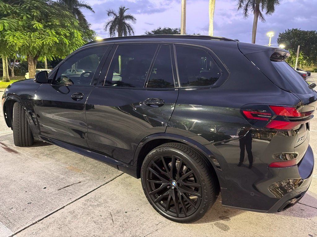 Certified Used 2024 Black Sapphire Metallic BMW xDrive40i image 3