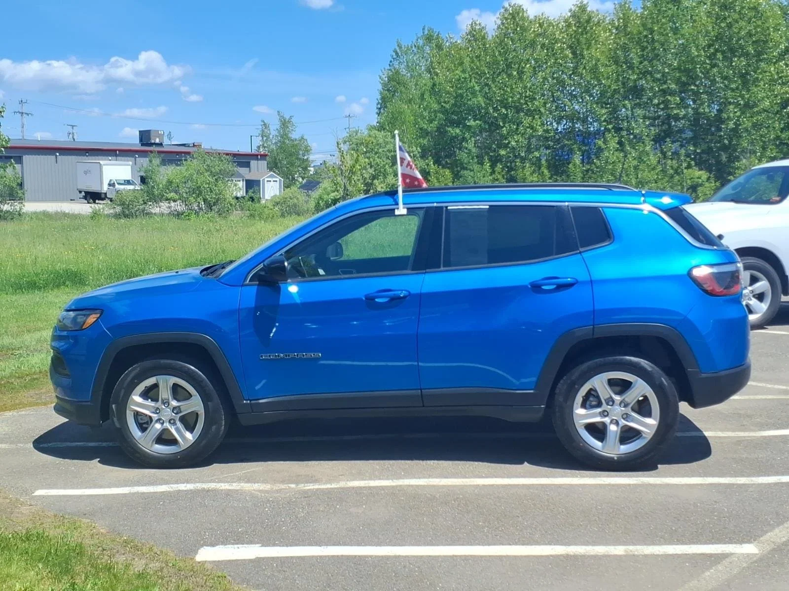 Used 2024 Blue Pearl Jeep Latitude image 8