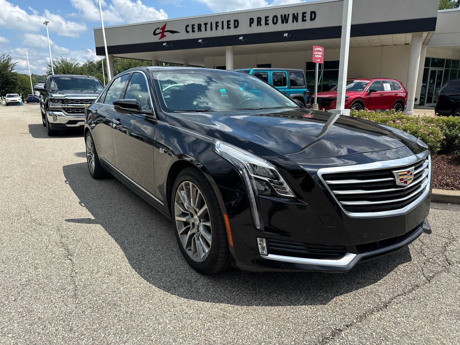 Used 2018 STELLAR BLACK METALLIC Cadillac Luxury AWD image 1