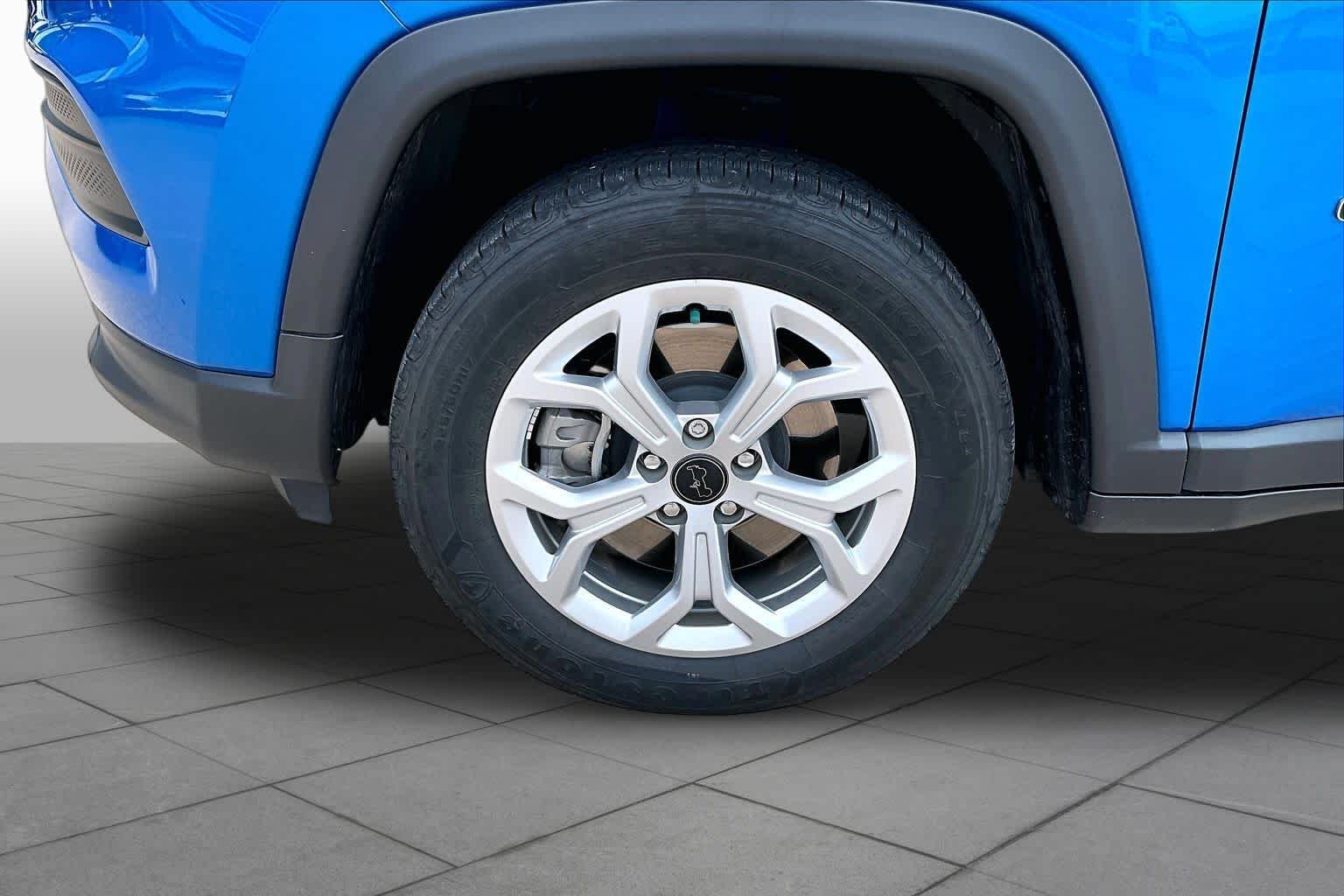 Used 2025 Hydro Blue Pearlcoat Jeep Sport image 12
