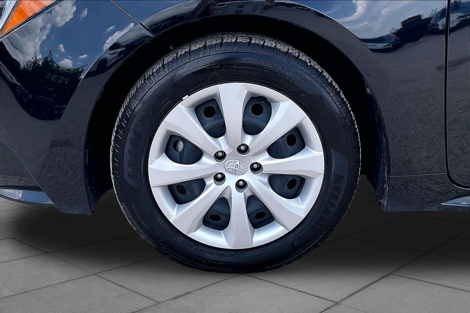 Used 2025 Midnight Black Metallic Toyota Hybrid LE image 11