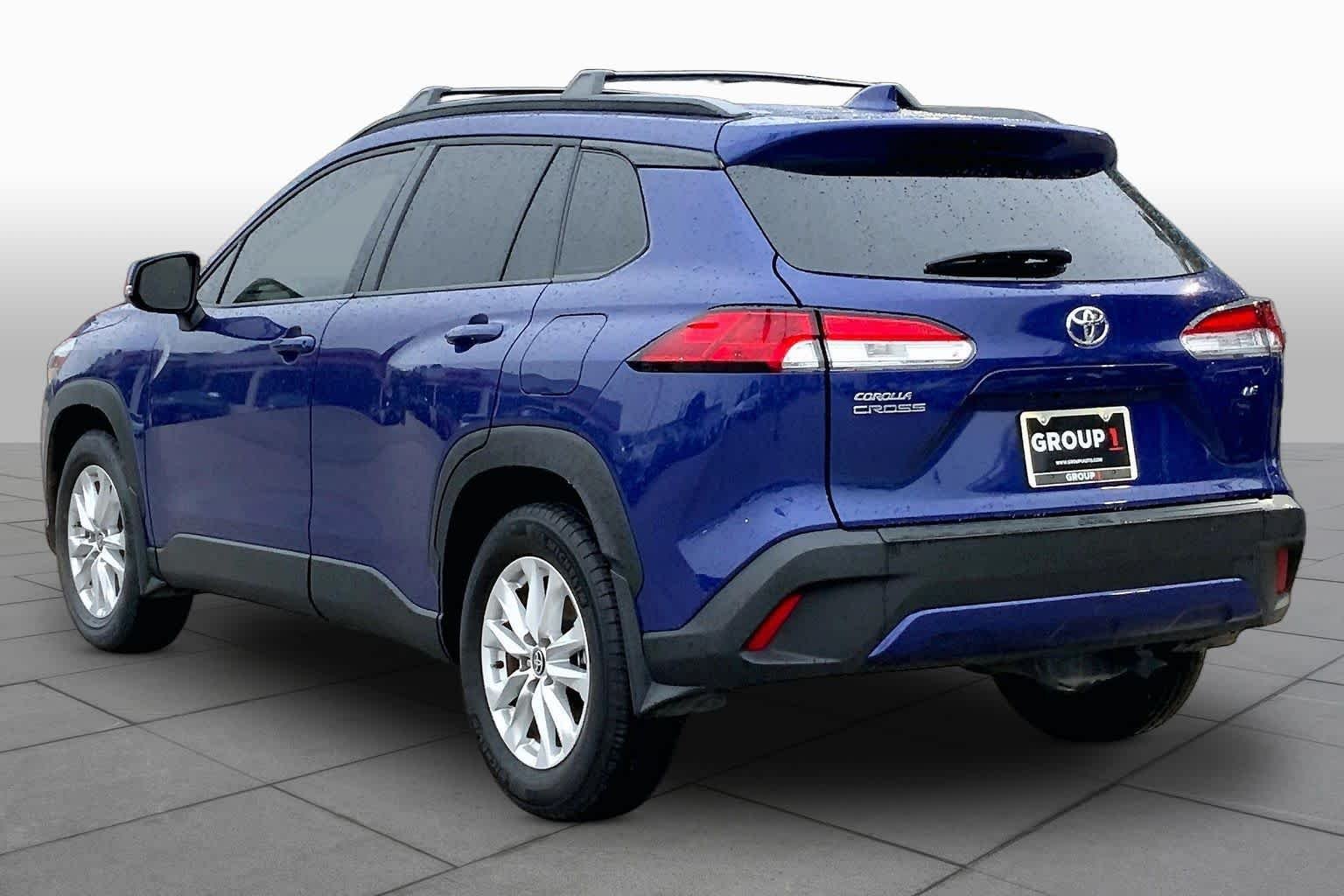 Used 2024 Blue Crush Metallic Toyota LE image 12