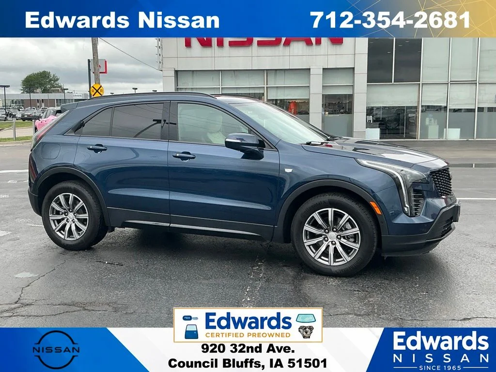 Used 2019 Blue Cadillac Sport image 1