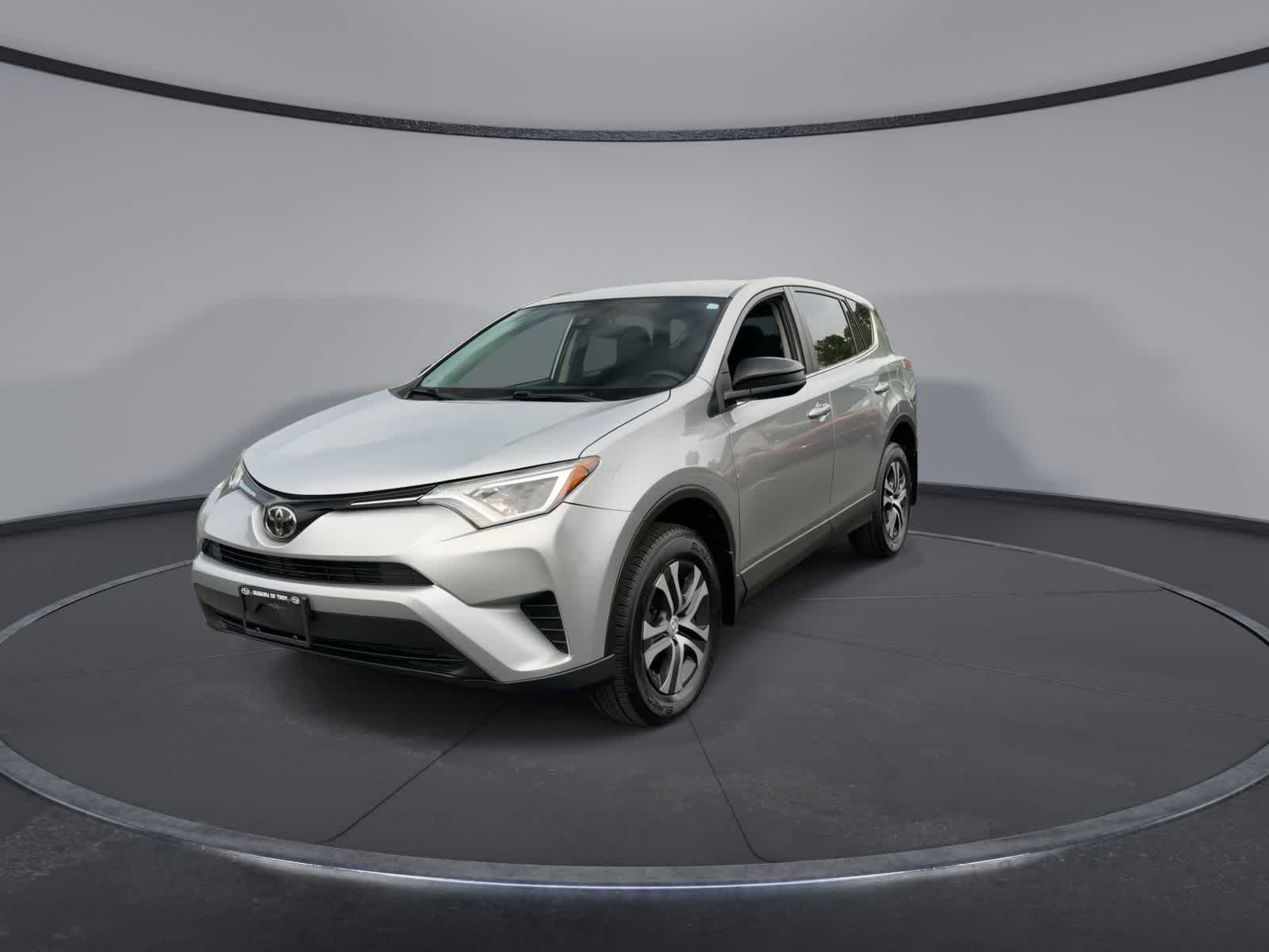 Used 2018 Silver Sky Metallic Toyota LE image 4