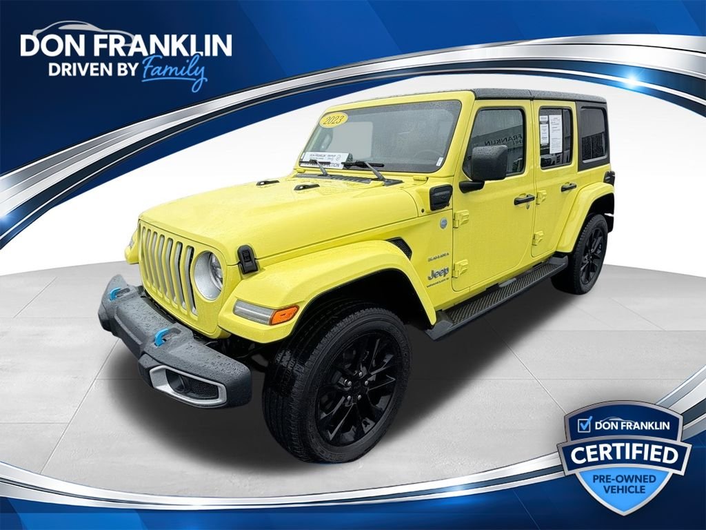 Used 2023 Yellow Jeep Sahara 4xe image 1