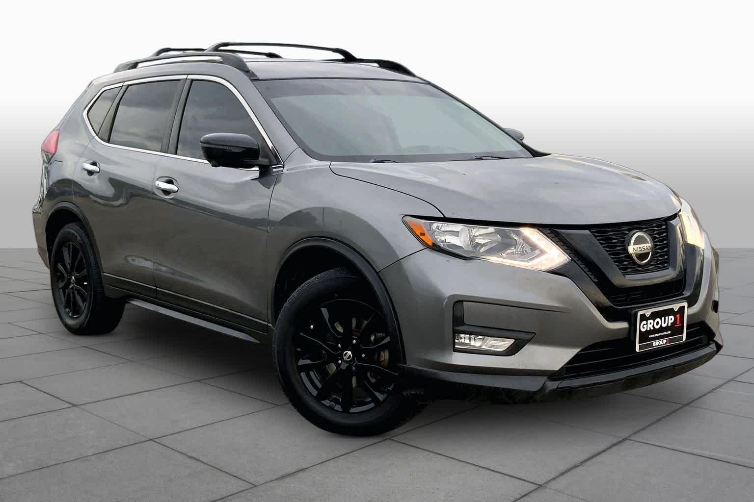 Used 2018 Gun Metallic Nissan SV image 3