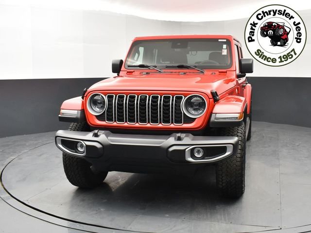 Used 2024 Jeep Wrangler 4-Door Sahara with VIN 1C4PJXEG5RW307331 for sale in Burnsville, Minnesota