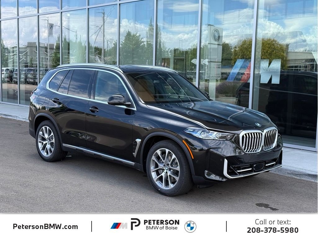 New 2026 Black Sapphire Metallic BMW xDrive50e image 7
