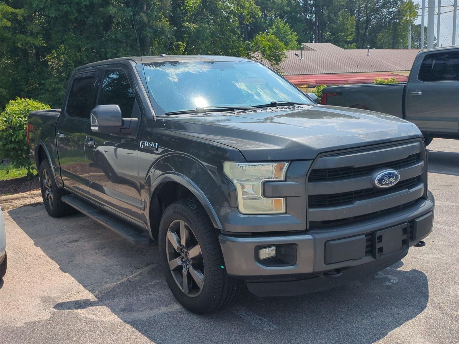 Used 2015 Magnetic Metallic Ford Lariat image 3