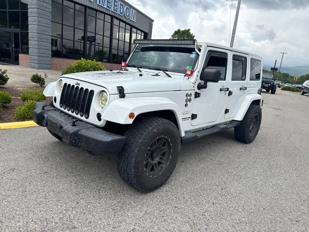 Used 2013 Bright White Jeep Unlimited Sahara image 2
