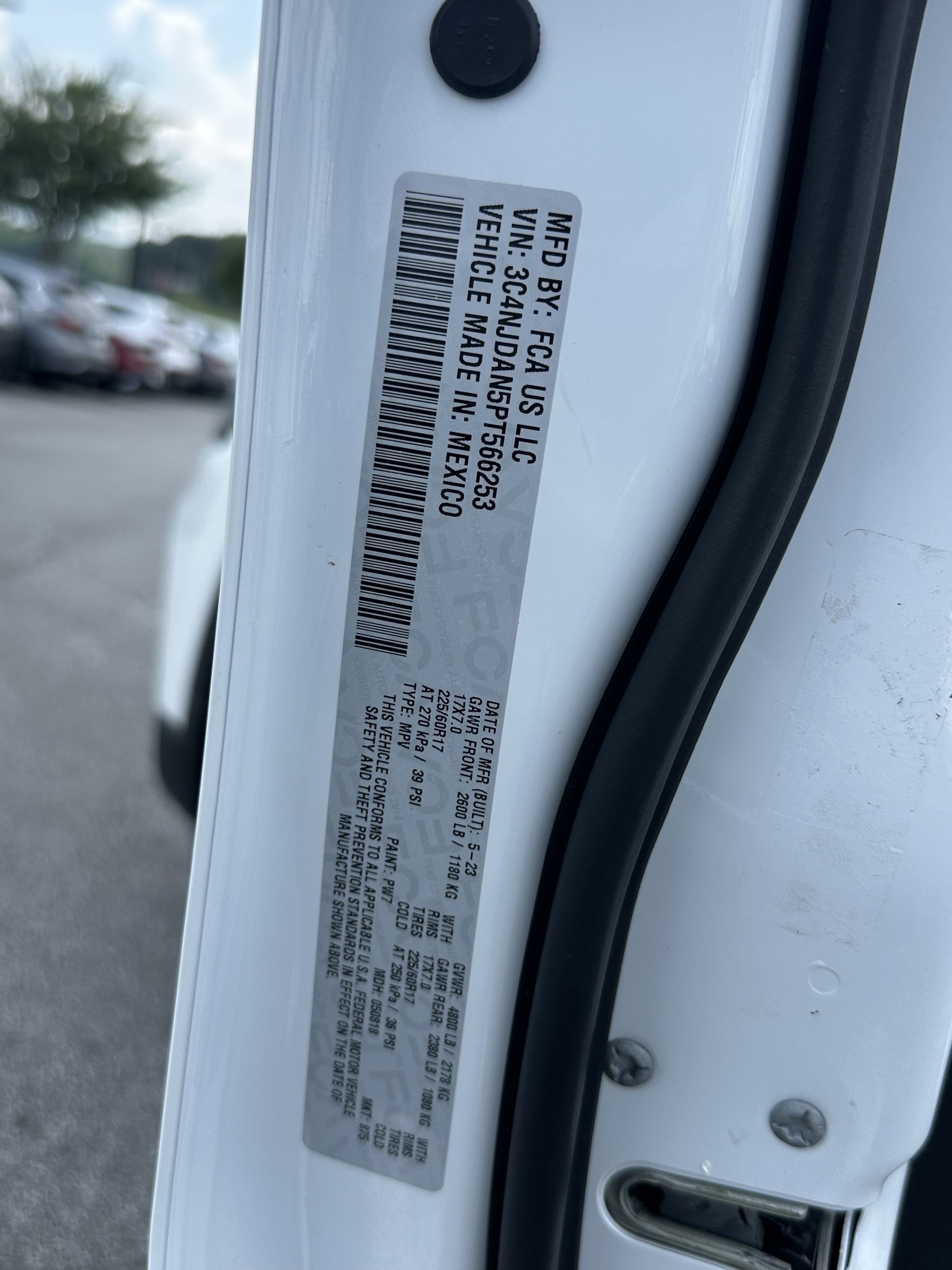 Used 2023 Bright White Clearcoat Jeep Sport image 32