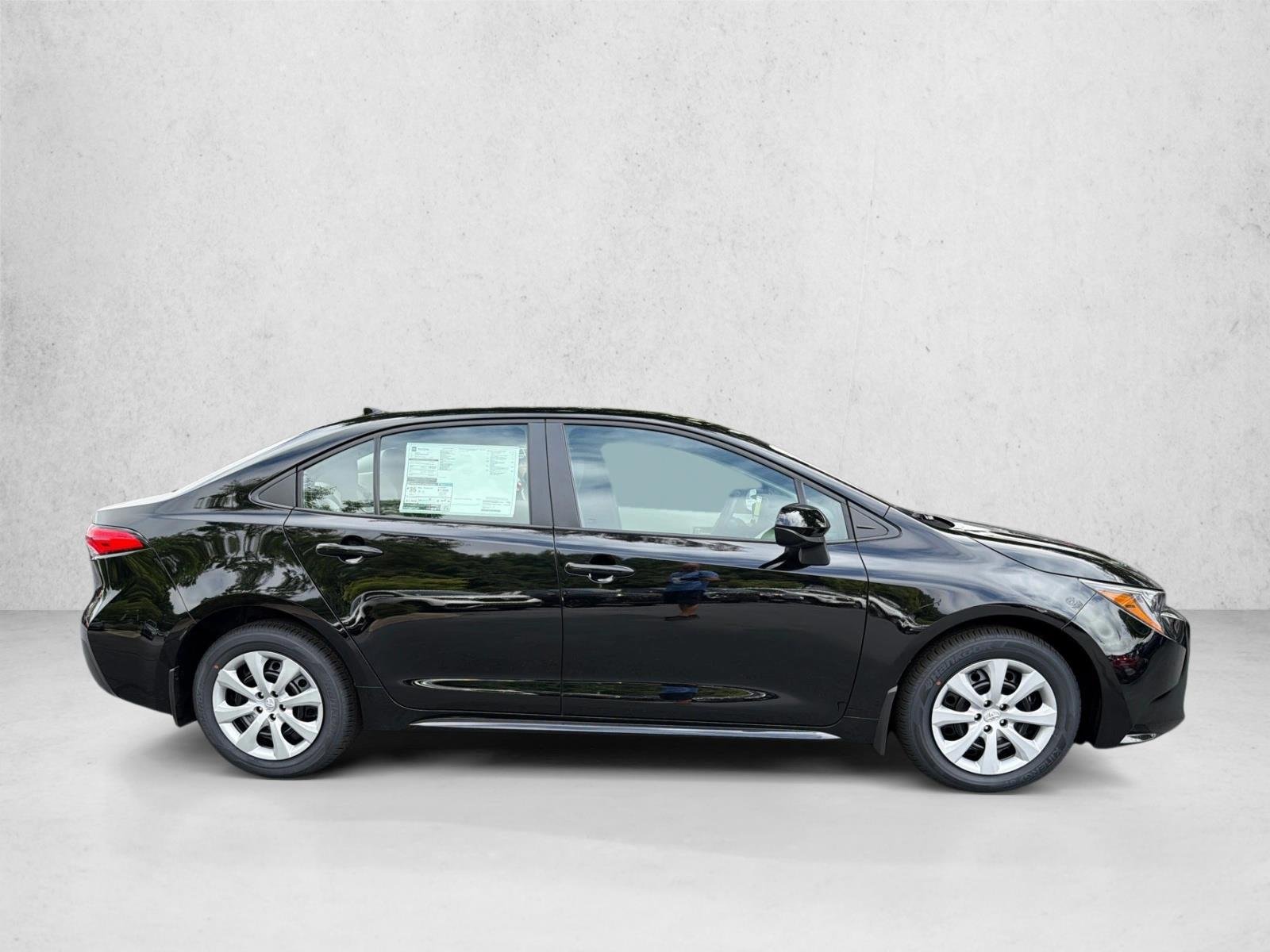 New 2026 Midnight Black Metallic Toyota LE image 2