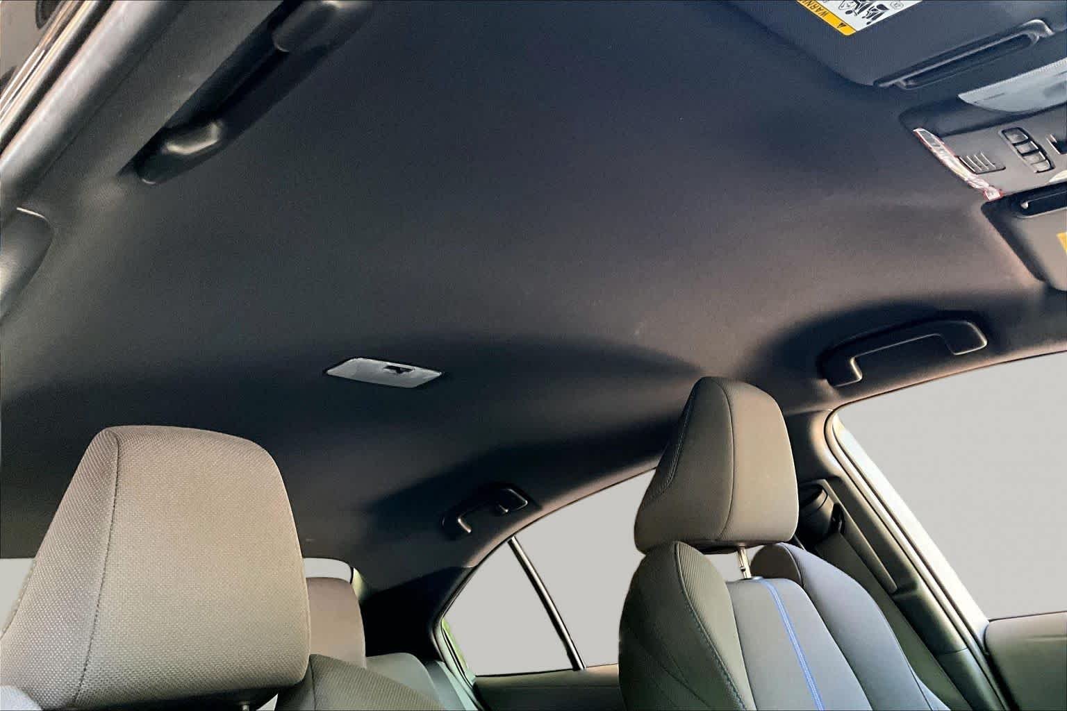 Used 2022 Black Sand Pearl Toyota SE image 13
