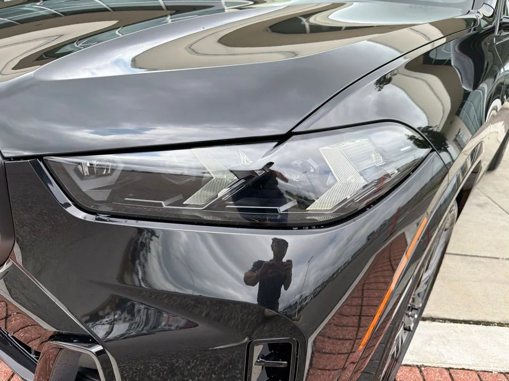 New 2026 Black Sapphire Metallic BMW M60i image 11