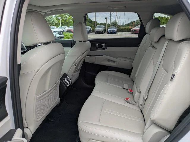 Used 2025 White Pearl Kia S image 13