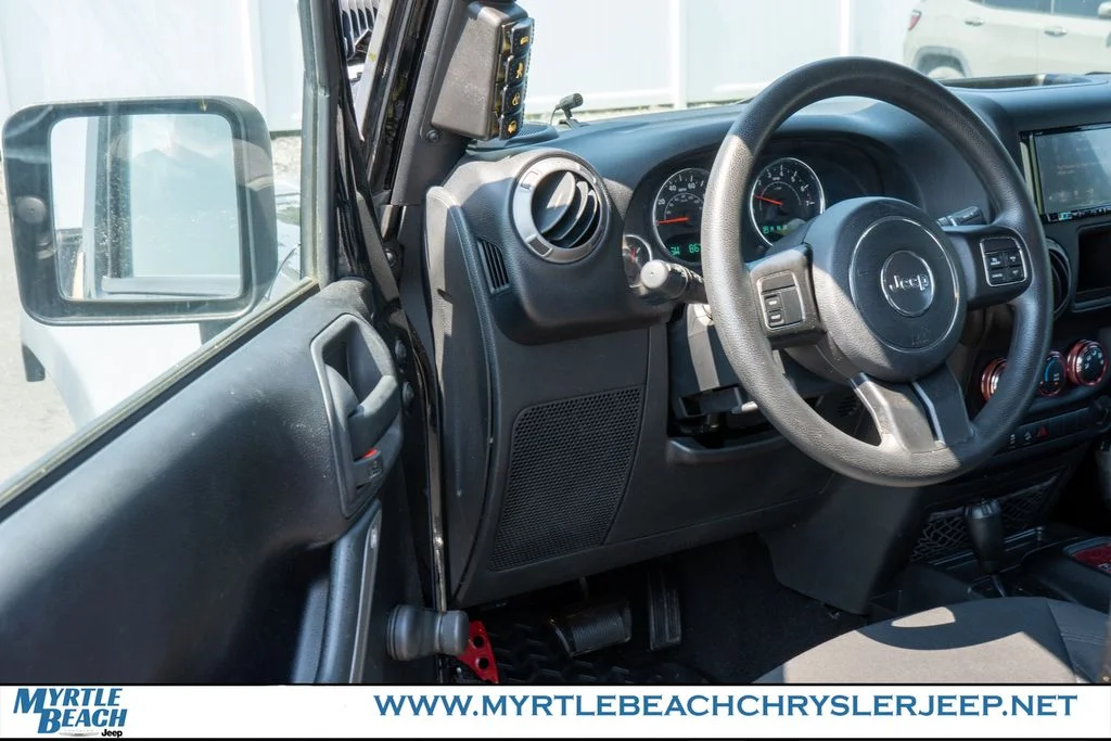 Used 2015 Black Clearcoat Jeep Unlimited Sport image 16