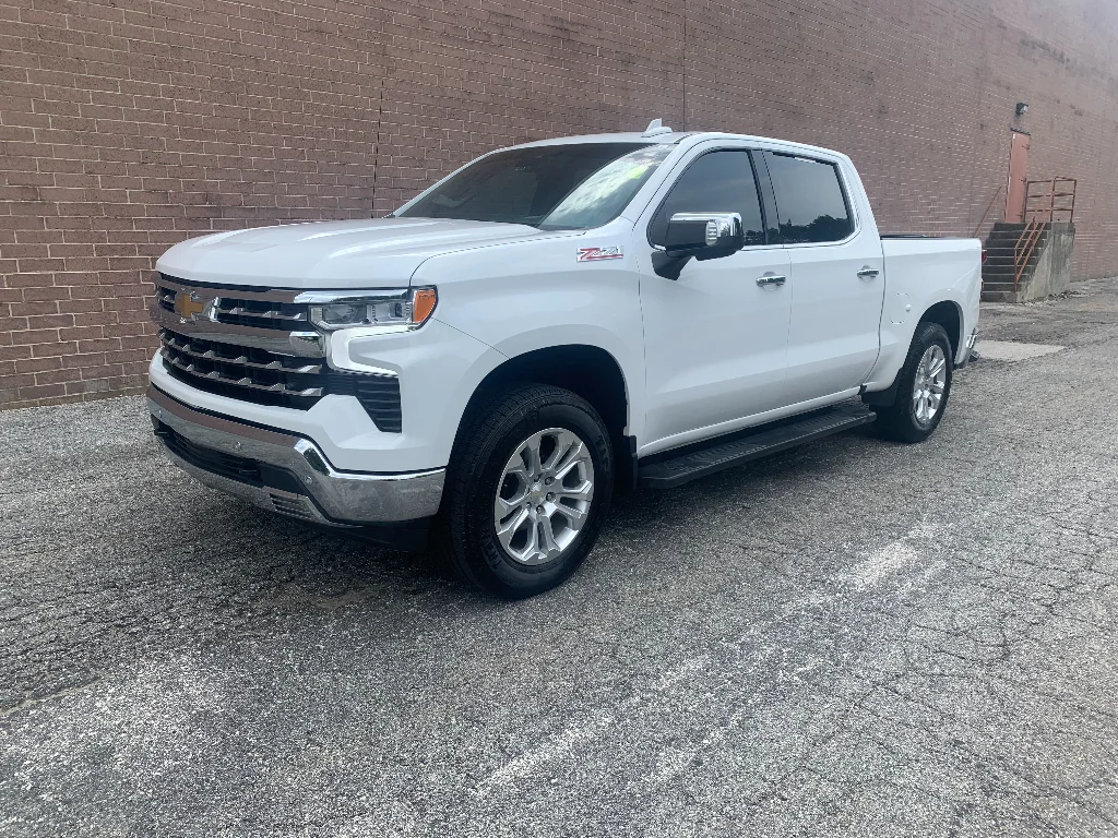 Used 2023 Summit White Chevrolet LTZ image 1