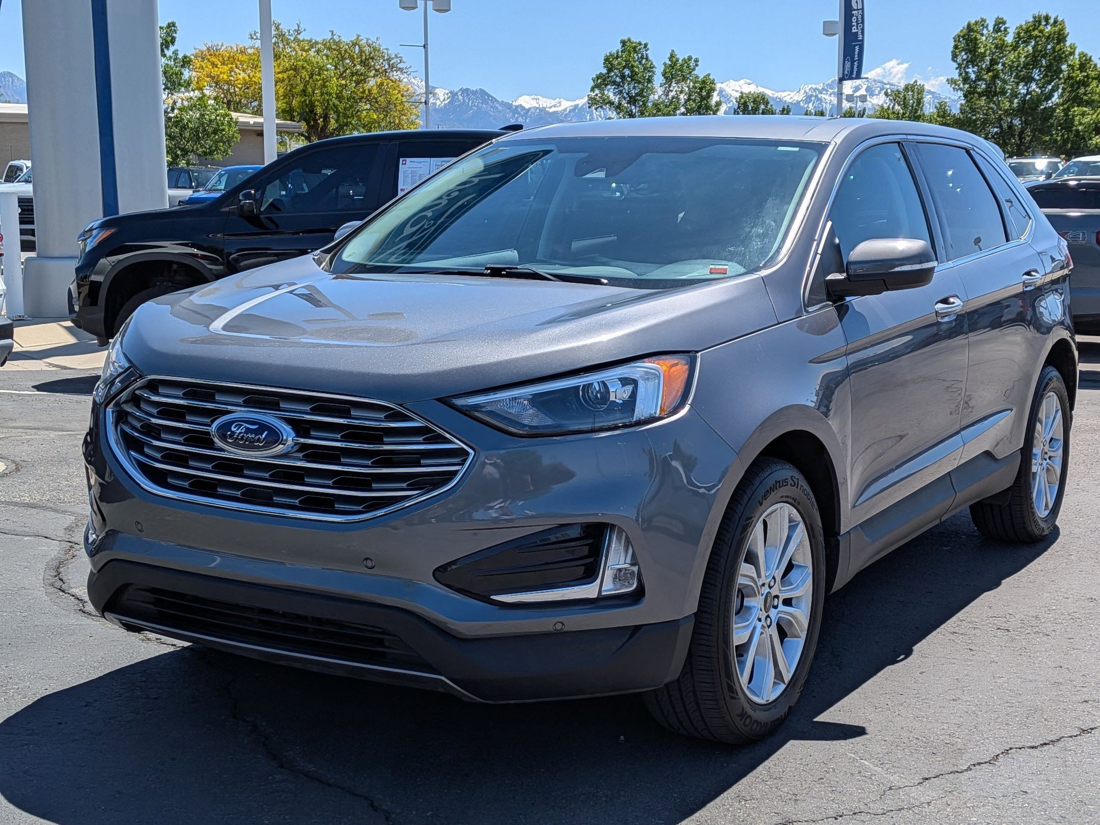 Certified Used 2024 Blue Ford Titanium image 8