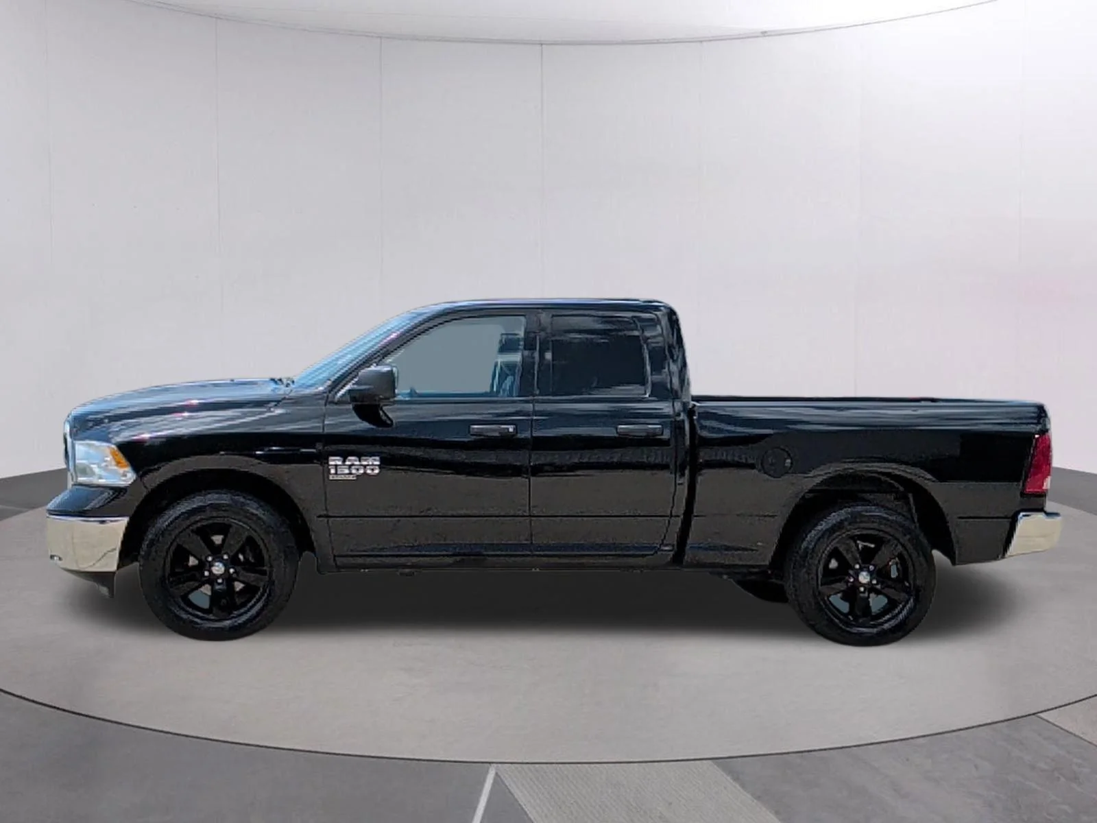 Used 2024 Diamond Black Crystal Pearlcoat Ram SLT image 2